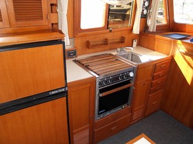 Kupiti 1988 CHB Tri-Cabin Trawler