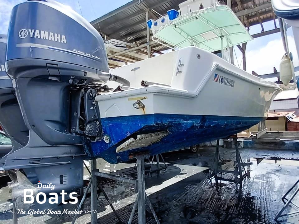 2004 Contender Center Console Cuddy Cabin for sale. View price, photos