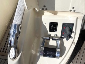 2007 Mochi Craft Dolphin 64 Sun Top satın almak