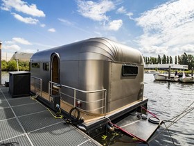 The Coon 1000 Houseboat